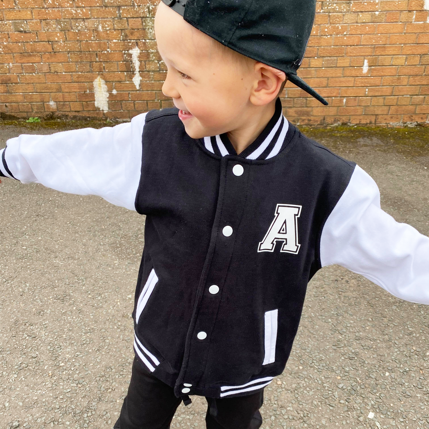 Letterman jacket 2025 black and white
